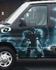Left Side of 2003 Unleashed Tour MAKUTA Van