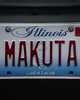 License plate of 2003 Unleashed Tour MAKUTA Van