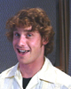 Jason Michas publicity photo #5, smiling at the mike